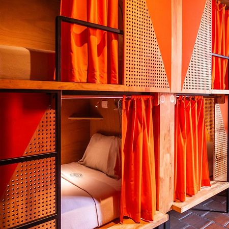 Adra Hostel Antigua Exterior photo A capsule hotel in Tokyo