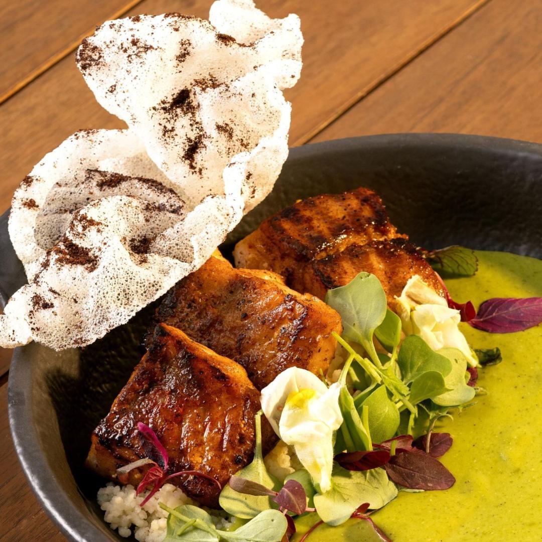 Adra Hostel Antigua Exterior photo A dish of Thai-style grilled chicken
